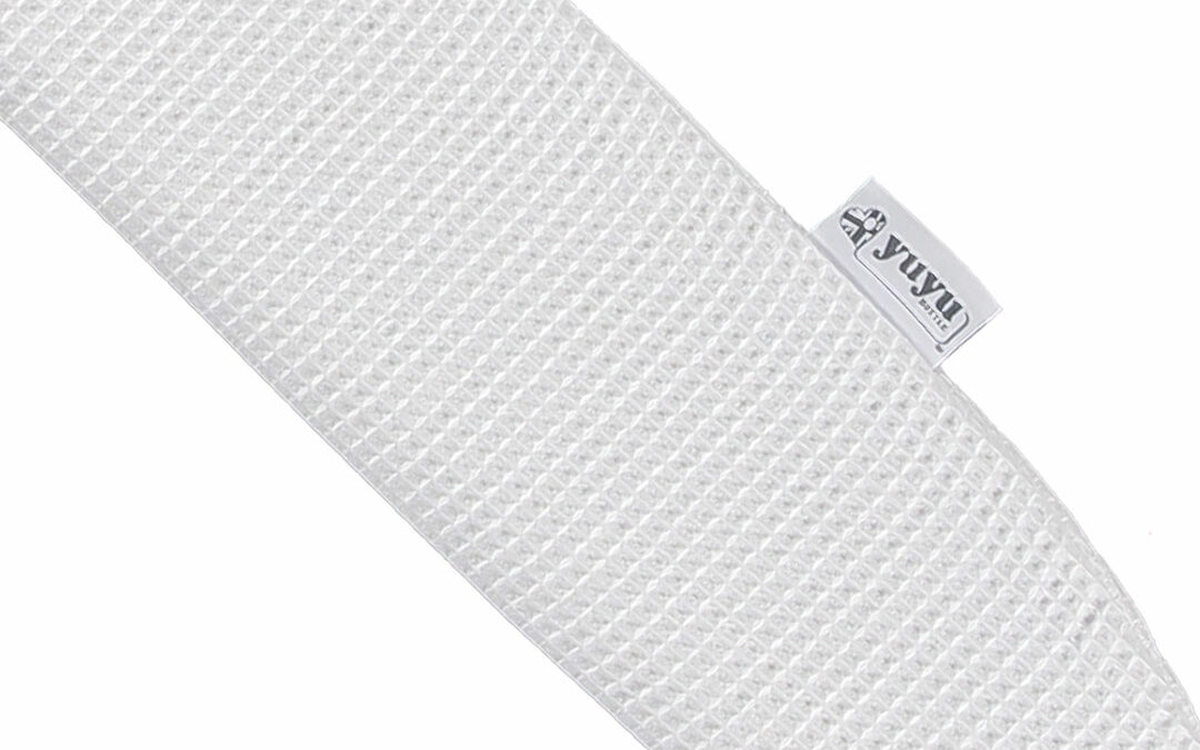 YuYu hot water bottle with white waffle cover