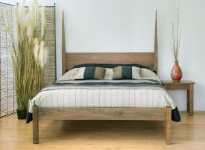 the exotic style Togo tall post wooden bed and matching bedside table