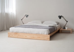 Minimal bedroom look - Dove grey linen bedding on low solid Ash Ki bed