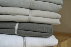 Linen Bedding Stack - Top to Bottom: Duck Egg, Dove Grey, Charcoal, White
