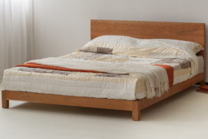 Modern low cherry sonora bed shown in kingsize