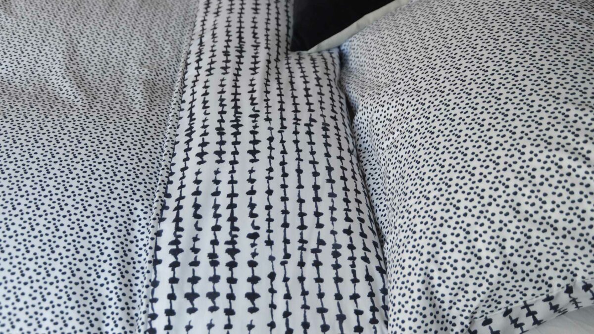 contemporary pattern reversible black and white duvet cover set, close up view