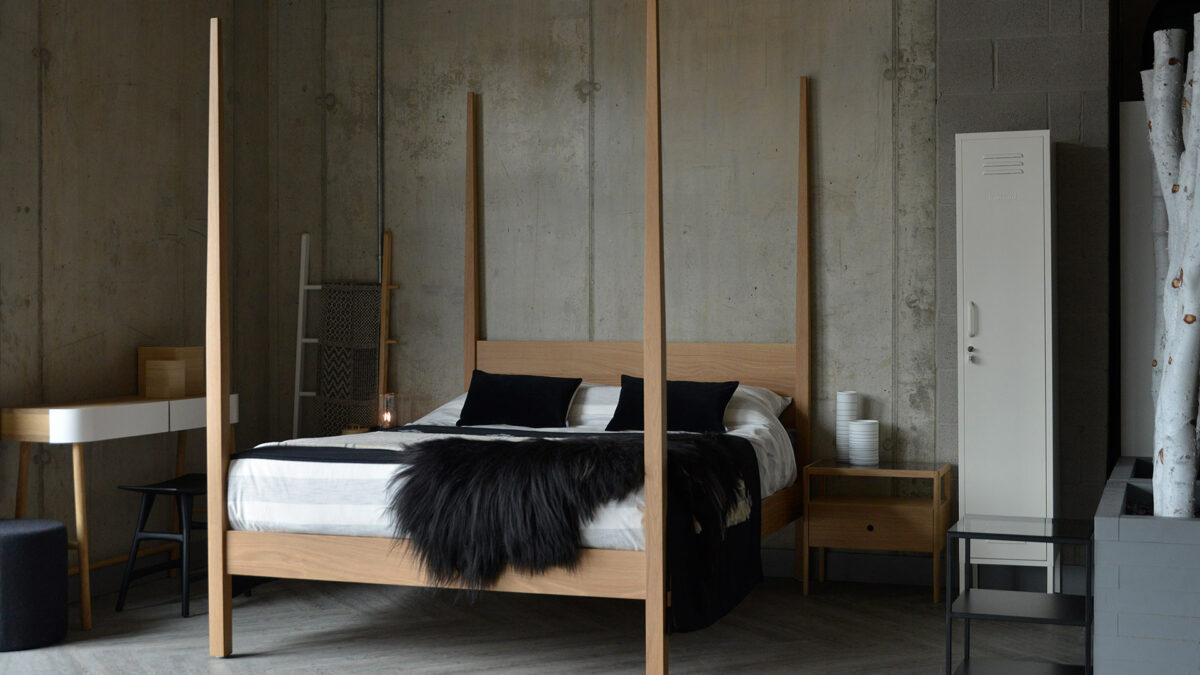 Hatfield a classic taller bed with 4 tall posts shown in solid oak