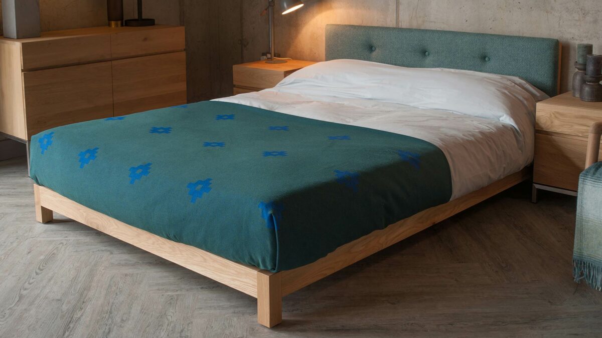 Angled view of British made Iona low upholstered bed