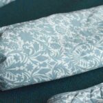 Long therapeutic hotwater bottle with liberty print cotton cover