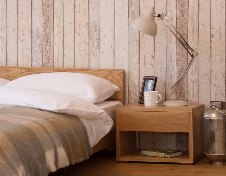 A Rustic bedroom look featuring our low wooden Nevada bed made from Oak