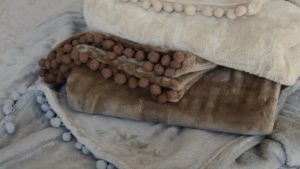fleecey-mini-pom-pom-throws