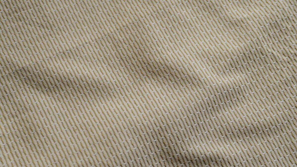 organic cotton wash cloth in camel shown close up