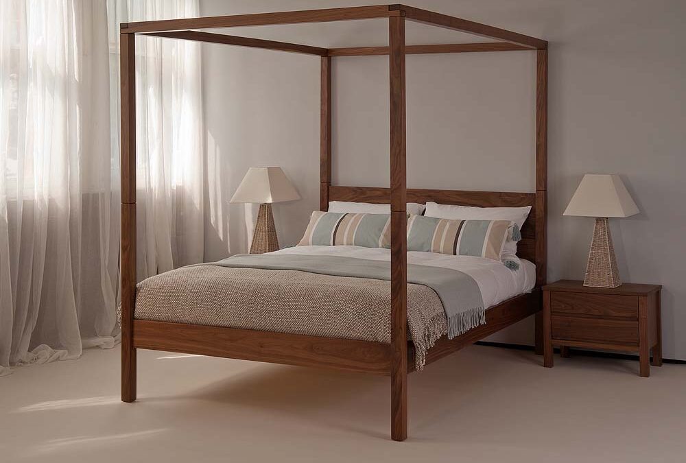 Our hand made Orchid Four Poster bed shown in Walnut